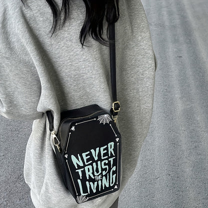 1pc Halloween Coffin-Shaped Fashion Shoulder Bag for Women, Sexy Gothic Faux Leather Crossbody Purse with "Never Trust The Living" Print, Zip Closure, Polyester Lining, and Edge Detailing