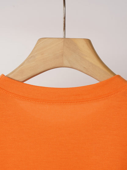 [Halloween Pumpkin T-Shirt] Halloween Pumpkin & Leopard Bow Print Women's T-Shirt | Vibrant Orange Casual Short Sleeve Crew Neck Top for Daily Wear, Costume Parties & Spring/Summer Outfits