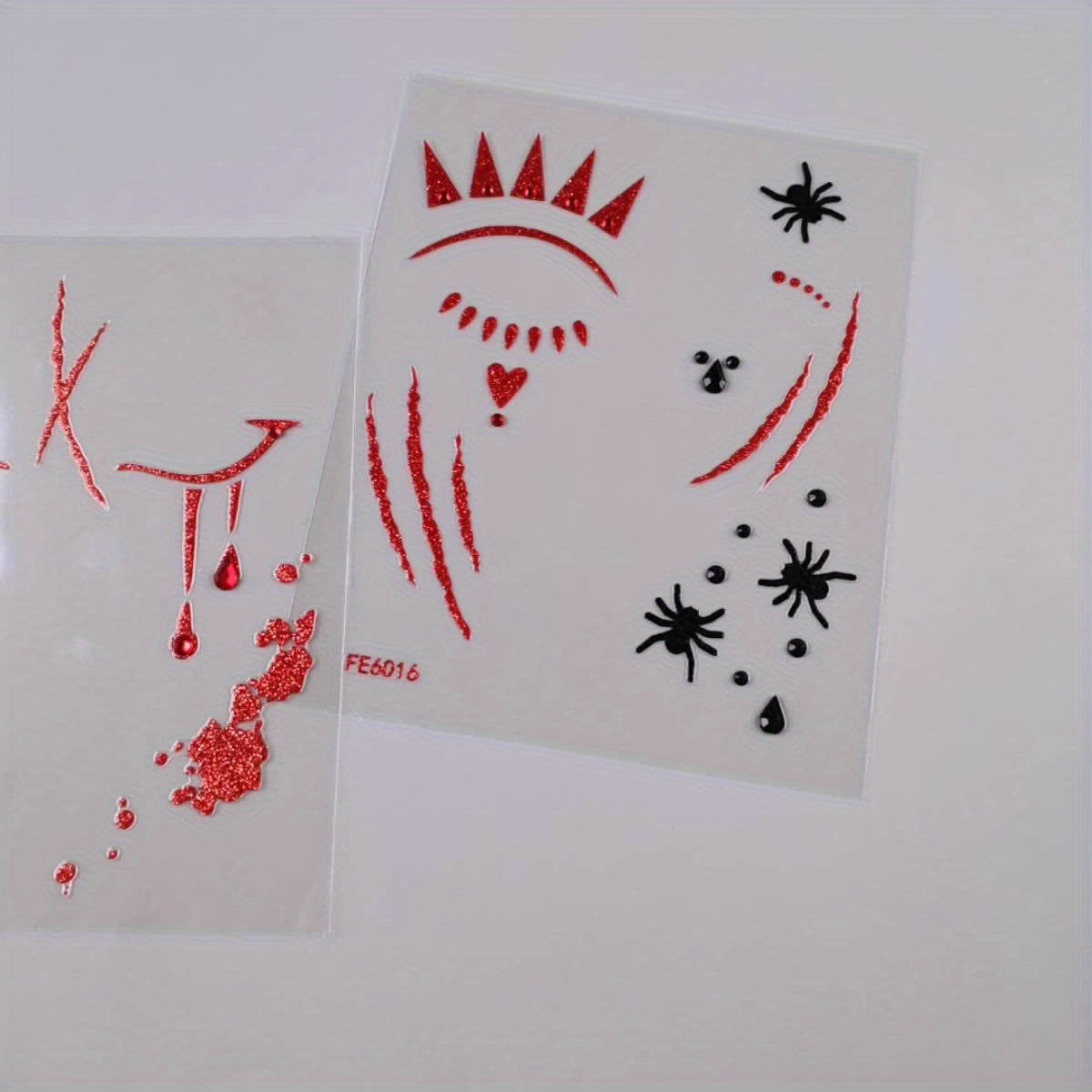 [Realistic Blood Face Stickers] 2 Sheets Red Glitter Blood Face Stickers - Realistic Fake Blood & Wound Effects, Glossy Self-Adhesive Temporary Tattoos for Halloween, Christmas, Themed Parties - Easy Apply, Perfect for Costum