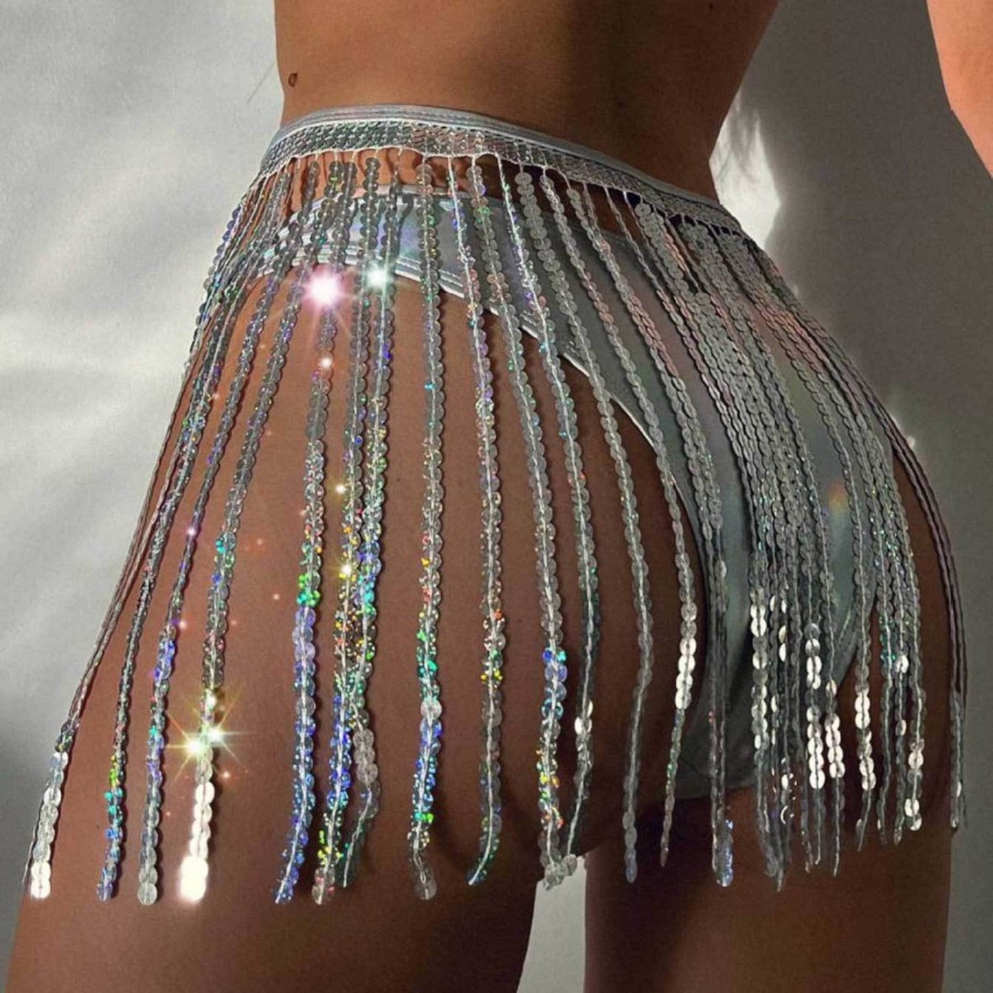 sparkling sequin tassel skirt in one piece - a must-have party artifact! Let you instantly transform into a sexy hottie, and your tasseled dress will shine all over the place, showing off your charm and confidence!